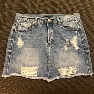 Jean skirts. Rips- size small. Buttons- size 27.